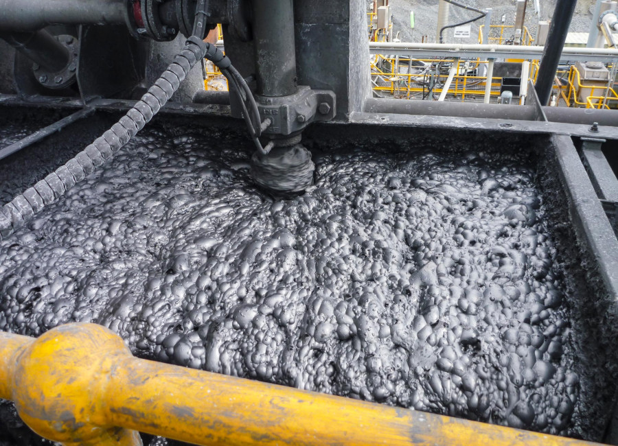 Froth floatation process extracting gold and antimony from ore.