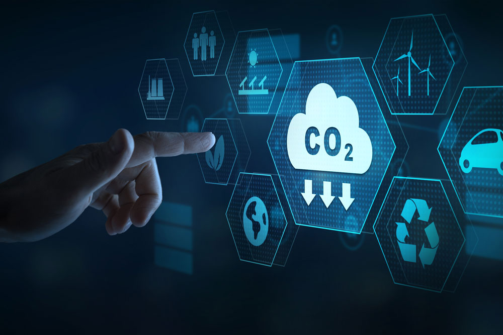 Hand pointing at options to reduce CO2 emission and carbon footprint, green business.